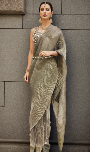 model wearing beige ready to wear saree
