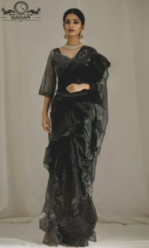 model wearing black flared readymade saree