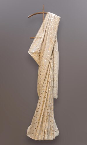 Image of White Saree In Silk With Foil Print and Sequins Border