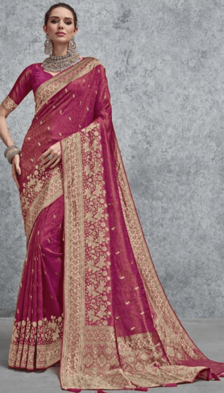 Magenta Banarasi soft silk saree with rich gold zari woven floral border and designer pallu, ideal for wedding, festive and party wear.