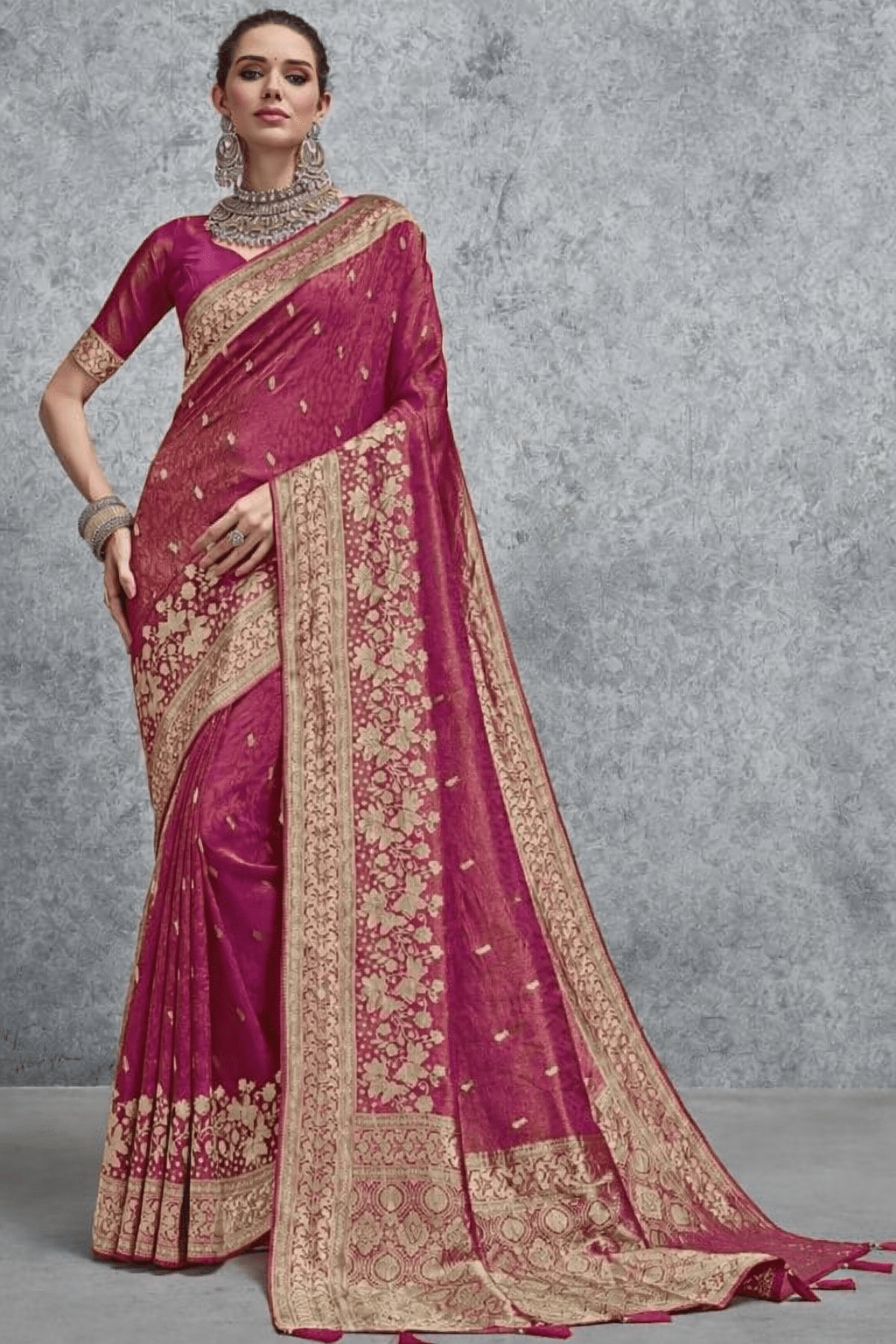 Magenta Banarasi soft silk saree with rich gold zari woven floral border and designer pallu, ideal for wedding, festive and party wear.