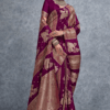 Elegant in purple and gold saree