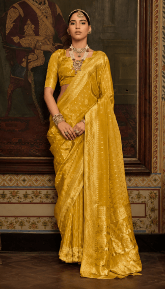 Mustard yellow silk saree with self-tone zari weave and shimmer finish, matching blouse