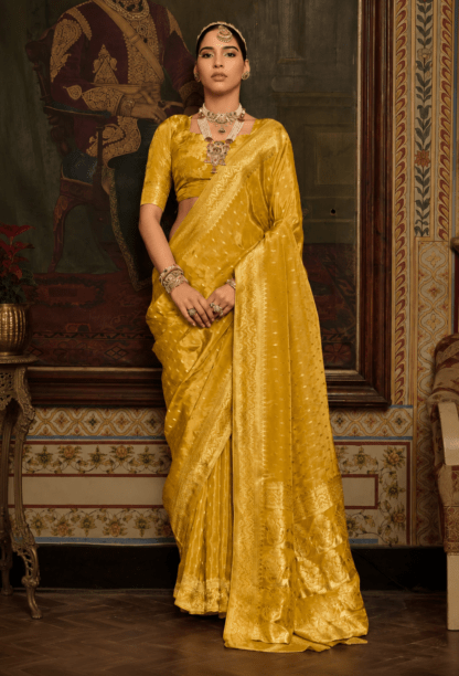 Mustard yellow silk saree with self-tone zari weave and shimmer finish, matching blouse
