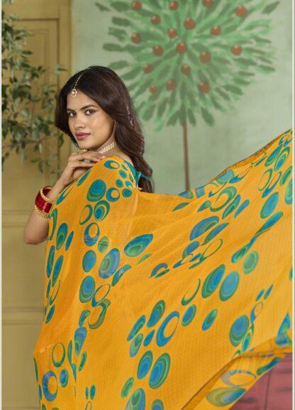 Mustard Yellow georgette bubble print saree with teal blouse piece - Sagar Sarees