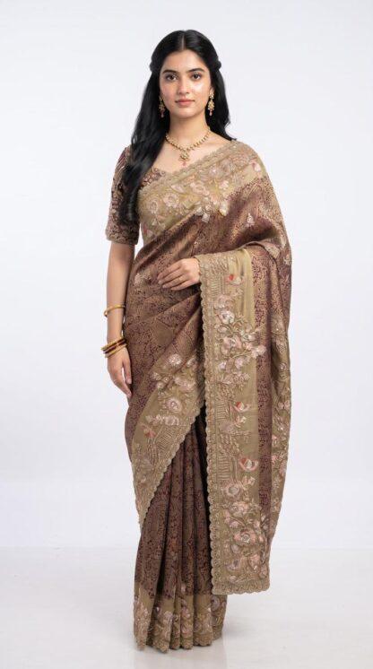 Wine tissue silk saree with gold floral embroidered pallu and border