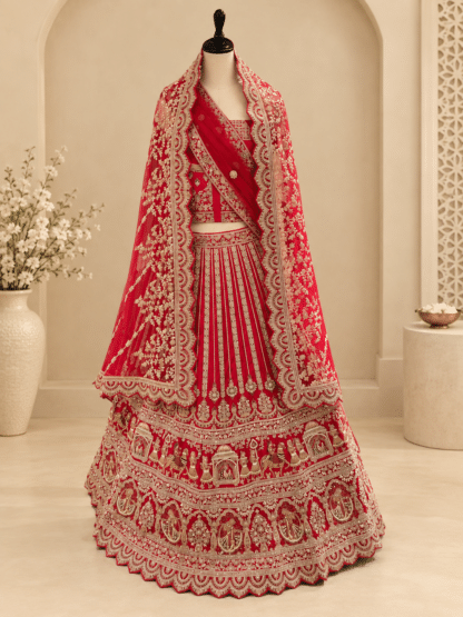Full view of red bridal lehenga with heavy embroidery and matching scalloped net dupatta on mannequin