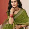 Woman wearing mehendi green chiffon saree with golden zari border and matching blouse
