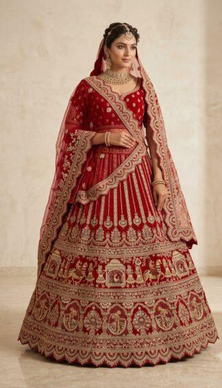 Full view of red bridal lehenga with heavy embroidery and matching scalloped net dupatta