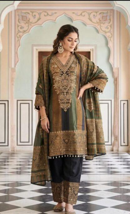 Model wearing mustard-olive striped silk suit set with embroidered dupatta and black pants, festive ethnic wear
