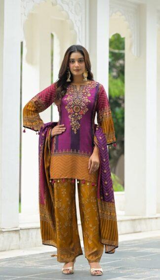 Woman wearing purple and mustard chevron print kurti palazzo set with embroidered neckline and matching dupatta