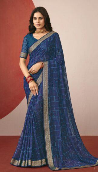 Woman wearing navy blue chiffon saree with abstract geometric print and golden zari border